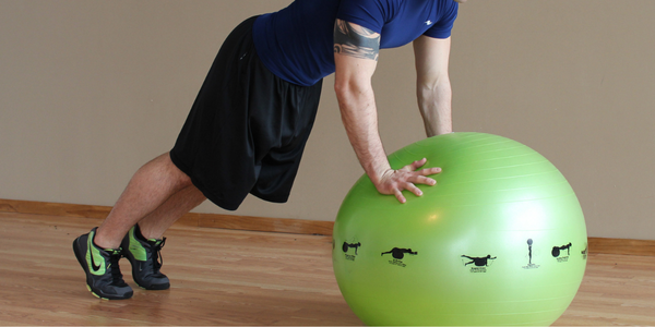 How To Do a Knee to Elbow Plank on the Stability Ball Step 4