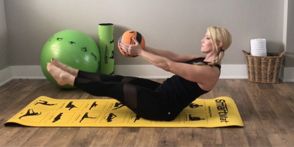 How To Do a V-Up Pulse with Medicine Ball–Pilates